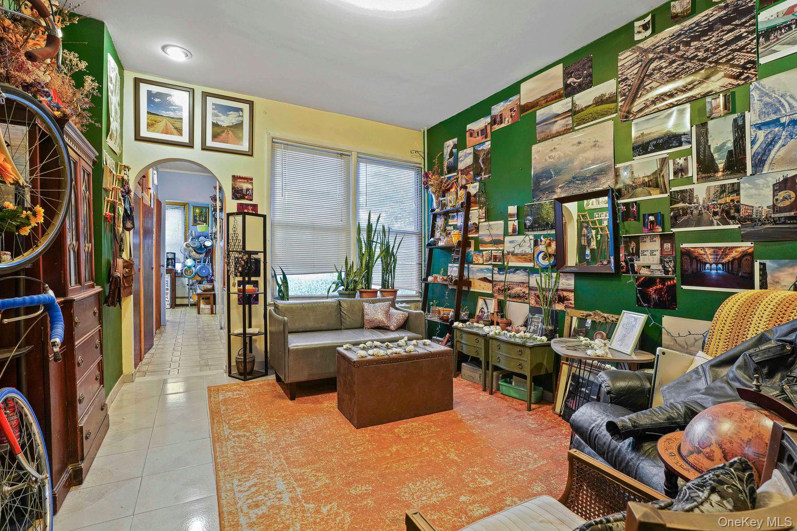 1920 Palmetto Street Queens, NY 11385 - Photo 11 of 26 a living room filled with furniture