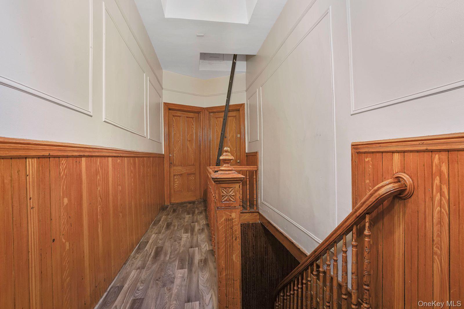 1920 Palmetto Street Queens, NY 11385 - Photo 19 of 26 a view of a balcony with wooden floor