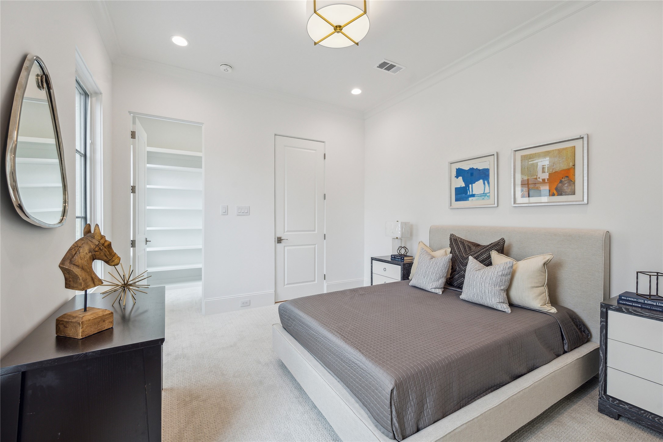 7 Wentworth Gate Path Houston, TX 77027 - Photo 30 of 42 Second-floor bedroom to feature a spacious walk-in closet and high-performance carpet. **Photo is of another home in the community and for information purposes only. Buyer to verify all details.**