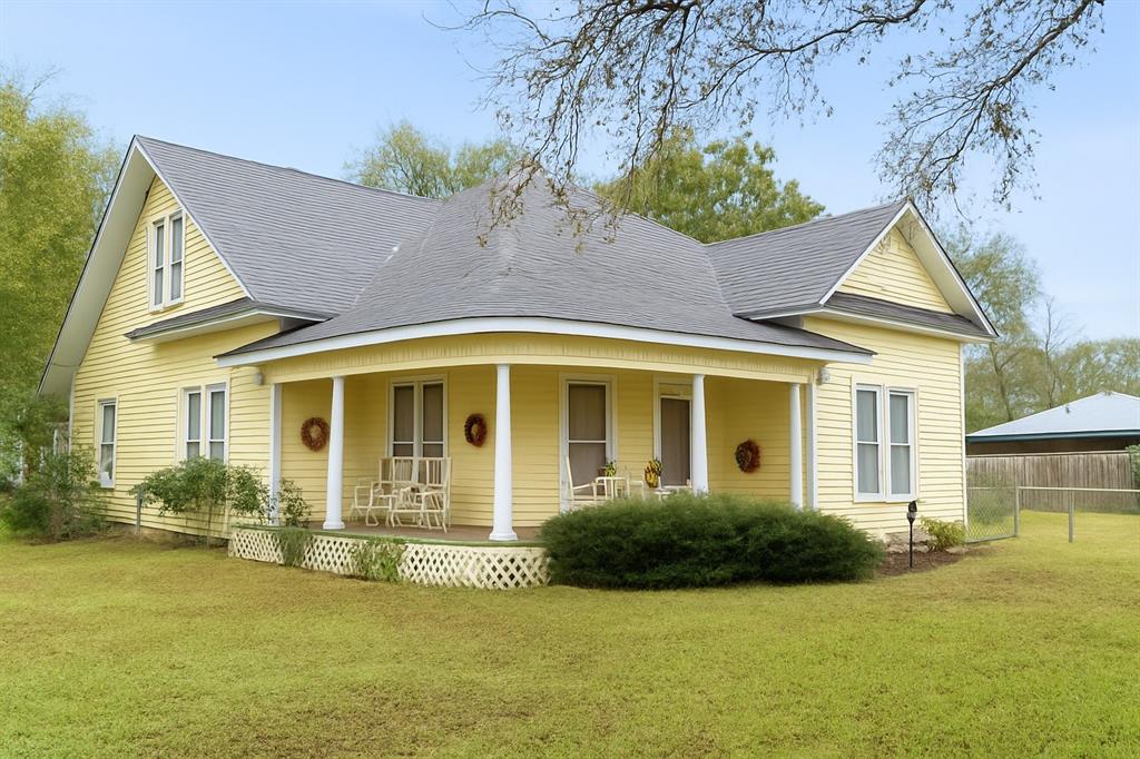 314 Cockerell Street Eustace, TX 75124 - Photo 1 of 15 View of front of house featuring covered porch and roof with shingles