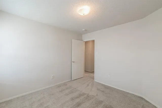 a view of a backyard with a garden