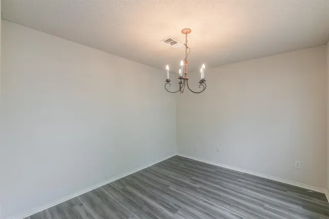 a empty room with a mirror