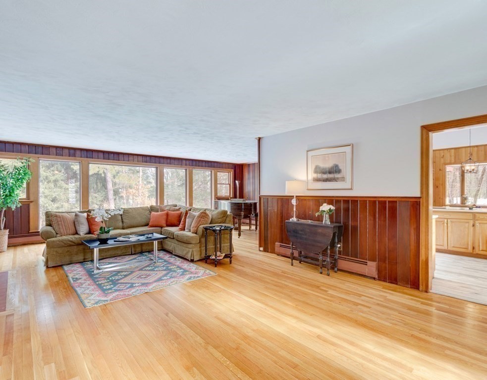 223 Sandy Pond Road Lincoln, MA 01773 - Photo 3 of 36 a living room with furniture and a window