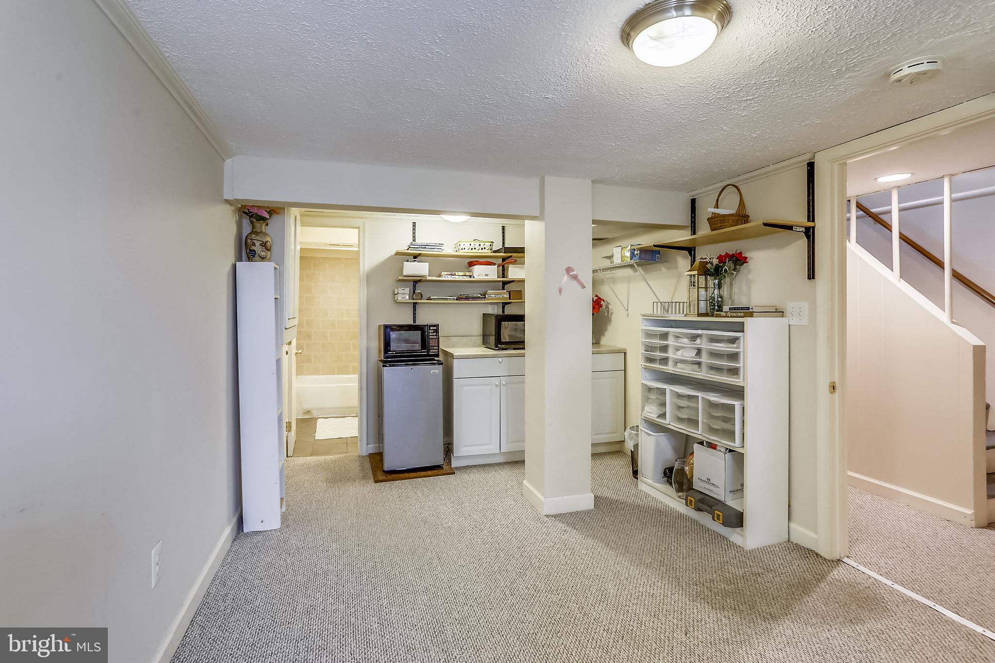 3115 Medway Street Silver Spring, MD 20902 - Photo 22 of 43 a view of a storage & utility room with refrigerator