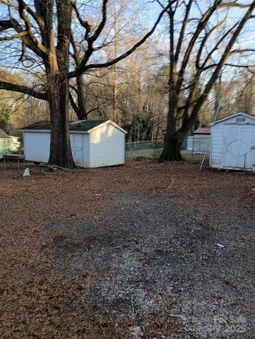 a view of house with a roof deck