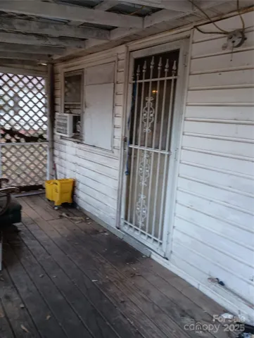 a view of outdoor space and wooden deck