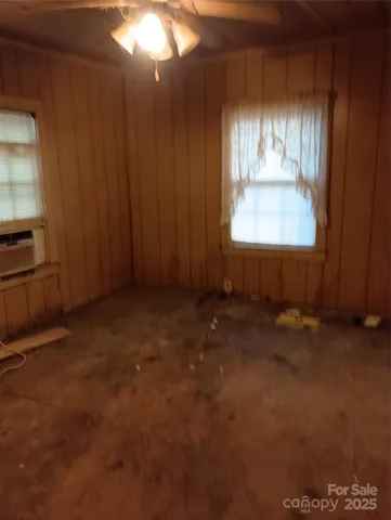a kitchen with a sink appliances and cabinets