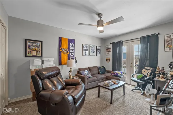 a view of a balcony with yard