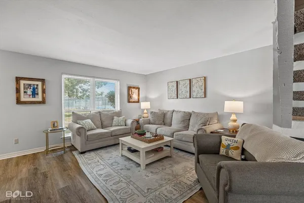 a living room with furniture and a couch