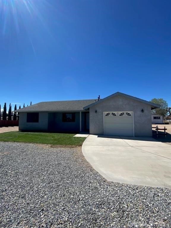14961 Walnut Street, Unit 2 Hesperia, CA 92345 - Photo 1 of 1 a house view with a backyard space