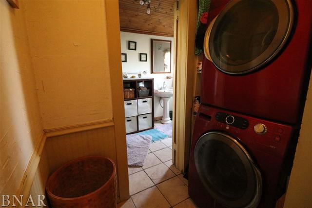 2234 Bearsdale Road Maroa, IL 61756 - Photo 8 of 17 a close view of a utility room with dryer and washer