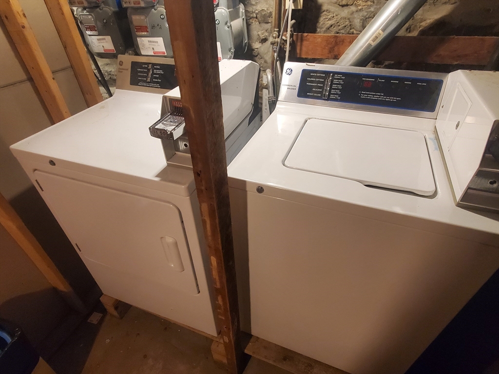 68 Nahant Avenue, Unit 2 Boston, MA 02122 - Photo 17 of 19 a utility room with dryer and washer