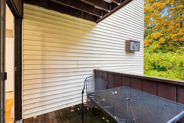 a view of balcony with a door