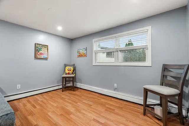 a room with a bed and a chair