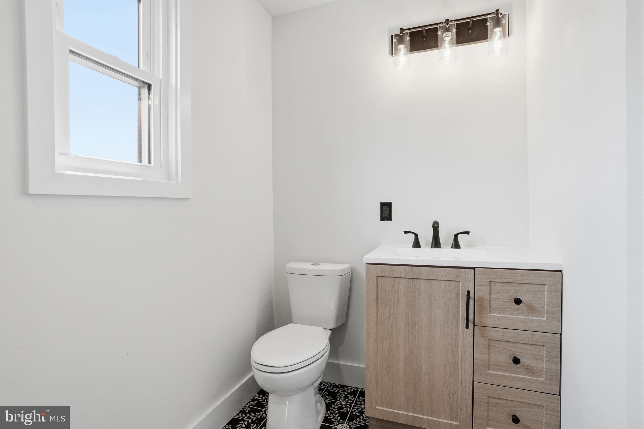 511 Sternermill Road Feasterville-Trevose, PA 19053 - Photo 25 of 32 a bathroom with a toilet and a sink