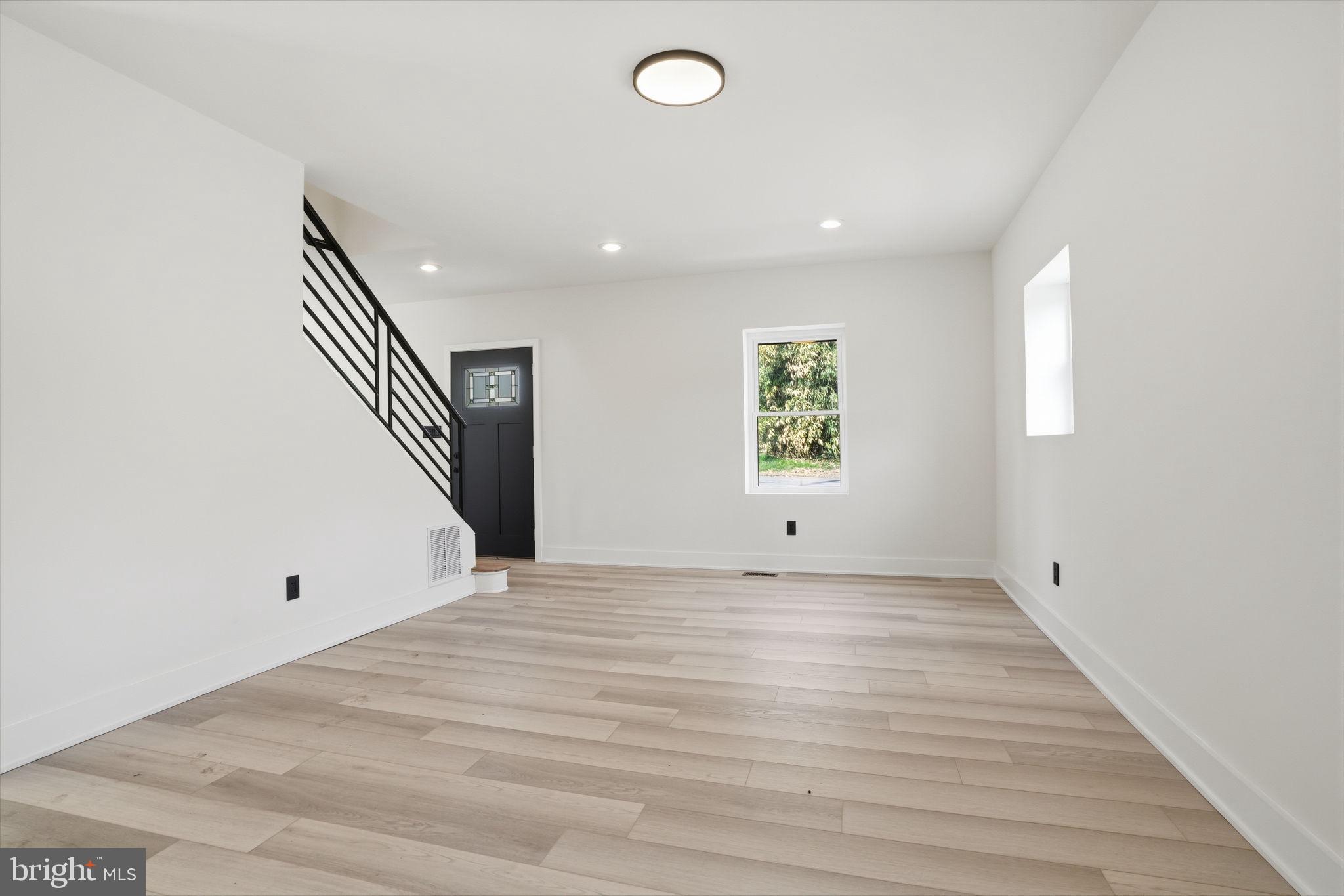 511 Sternermill Road Feasterville-Trevose, PA 19053 - Photo 5 of 32 wooden floor in an empty room with a window
