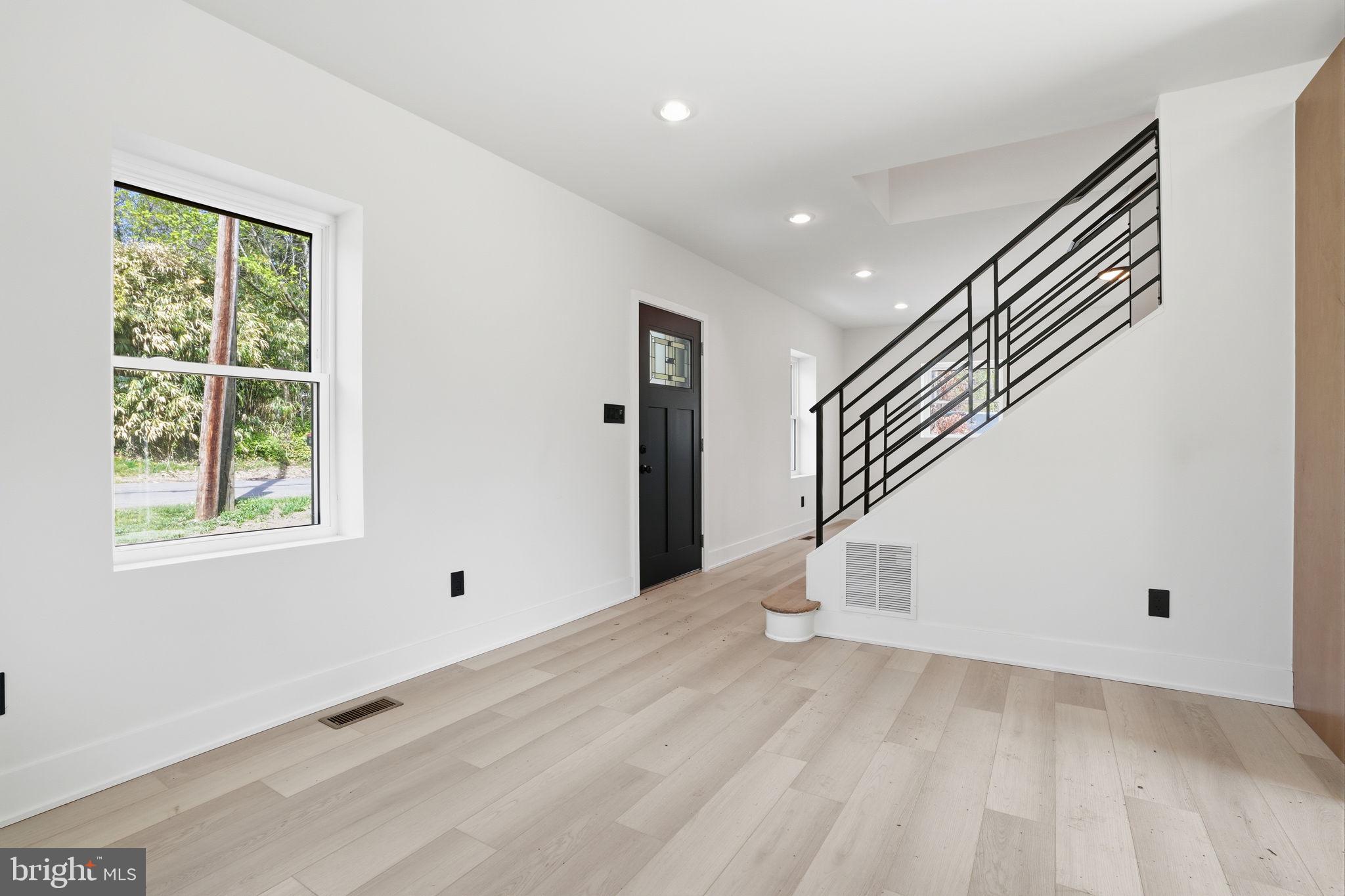 511 Sternermill Road Feasterville-Trevose, PA 19053 - Photo 8 of 32 wooden floor in an empty room with a window