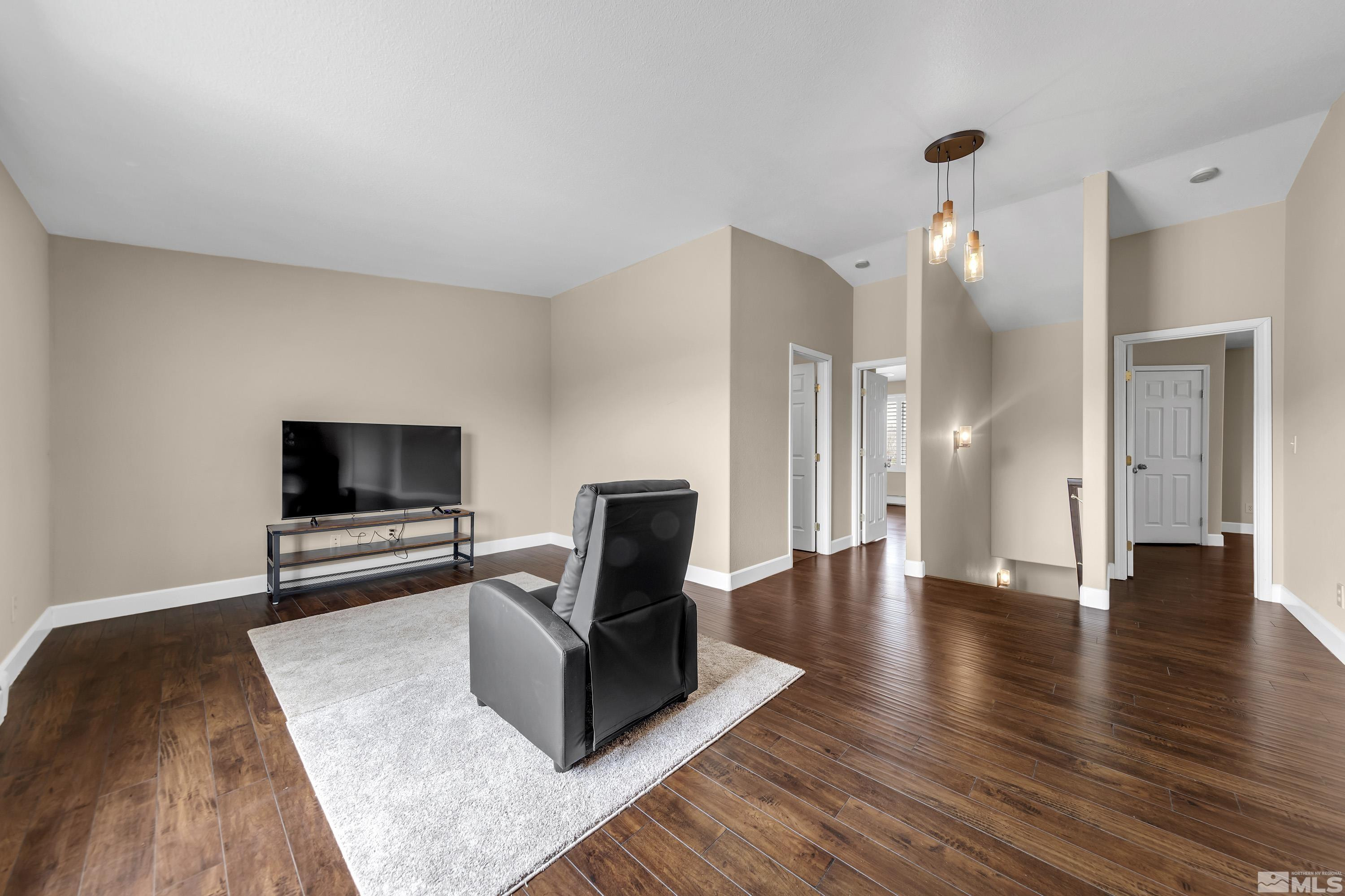 2055 Antelope Valley Road Reno, NV 89506 - Photo 16 of 40 a living room with furniture and a flat screen tv