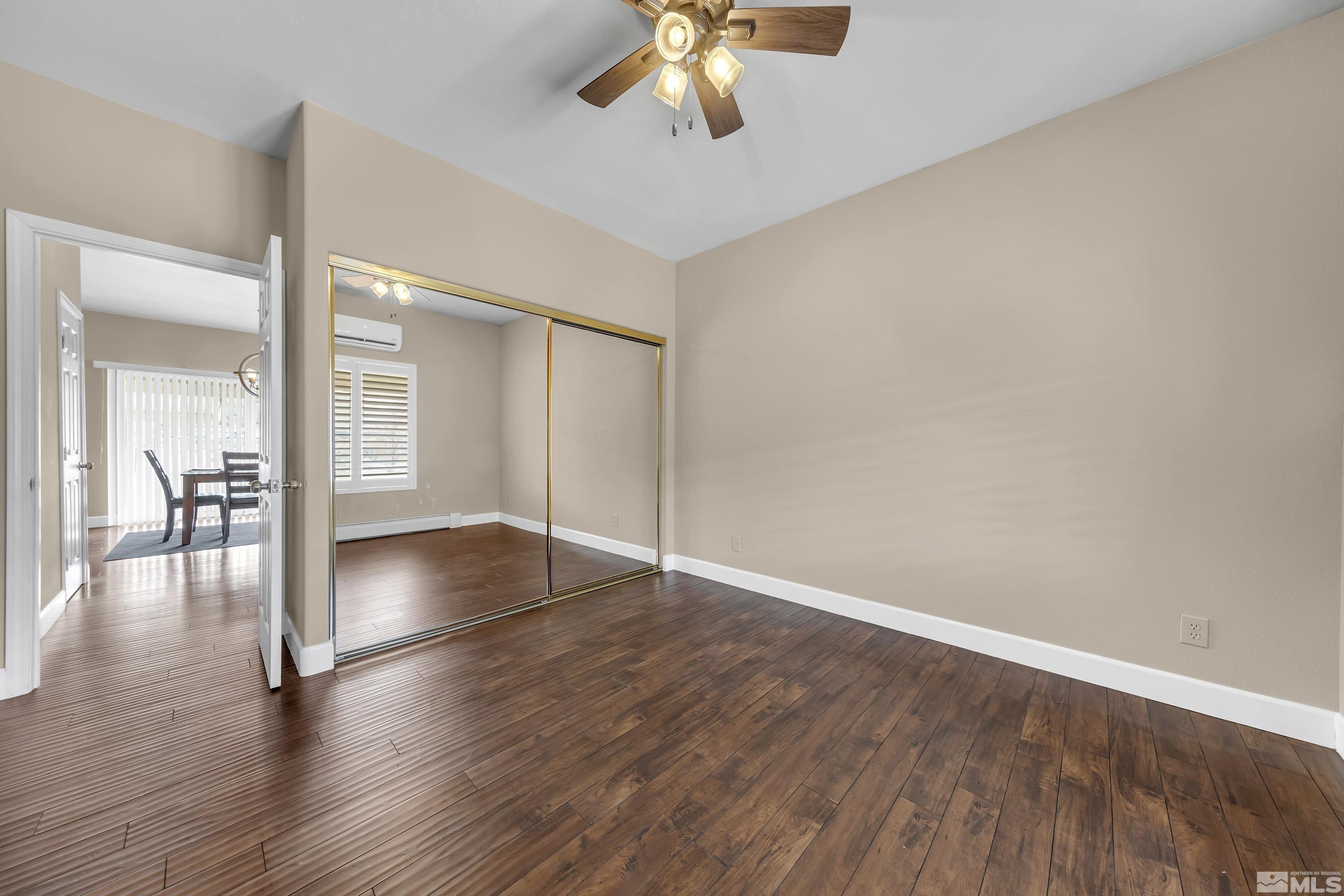 2055 Antelope Valley Road Reno, NV 89506 - Photo 26 of 40 a view of empty room with wooden floor