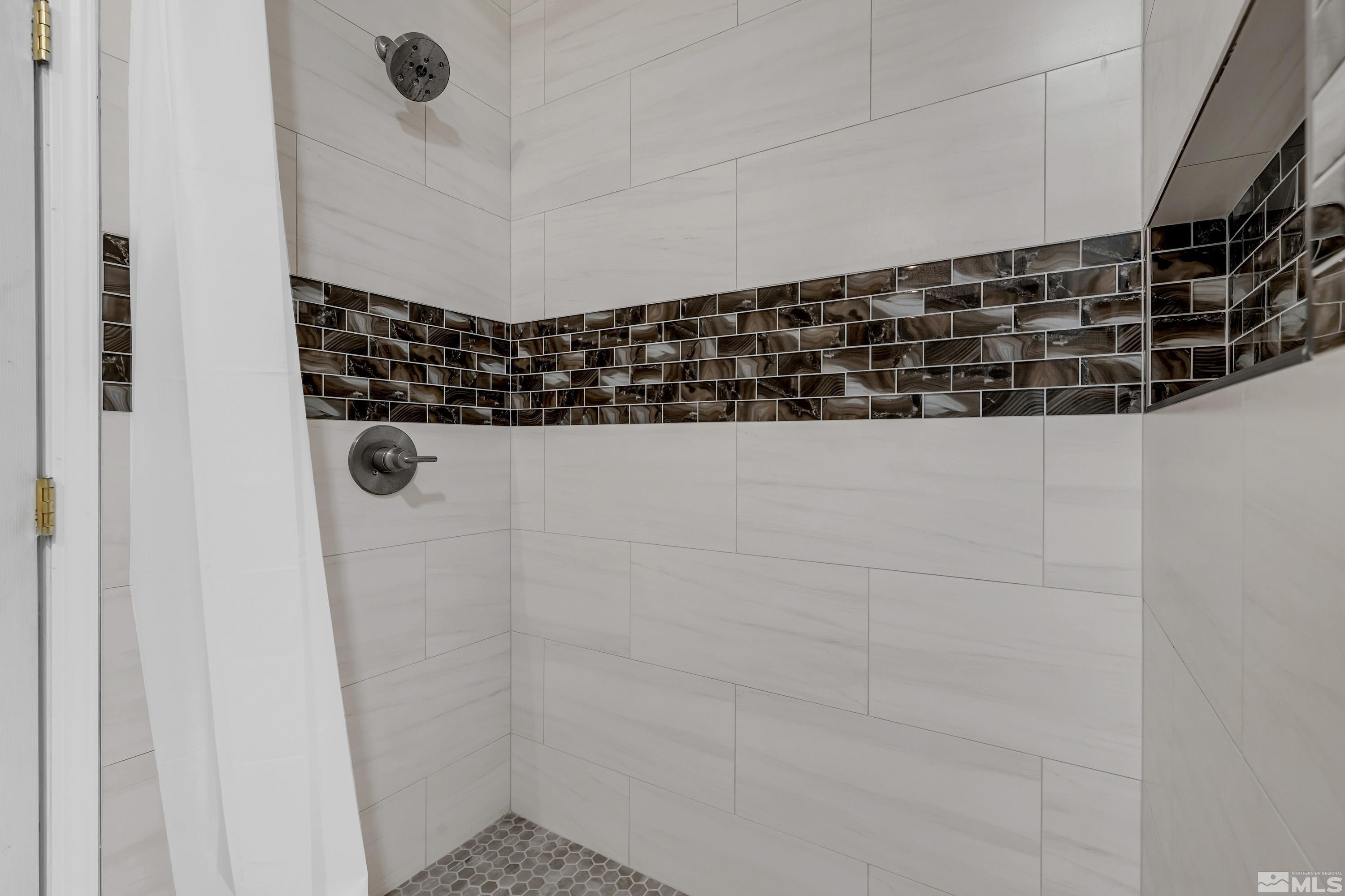 2055 Antelope Valley Road Reno, NV 89506 - Photo 28 of 40 a bathroom with a shower