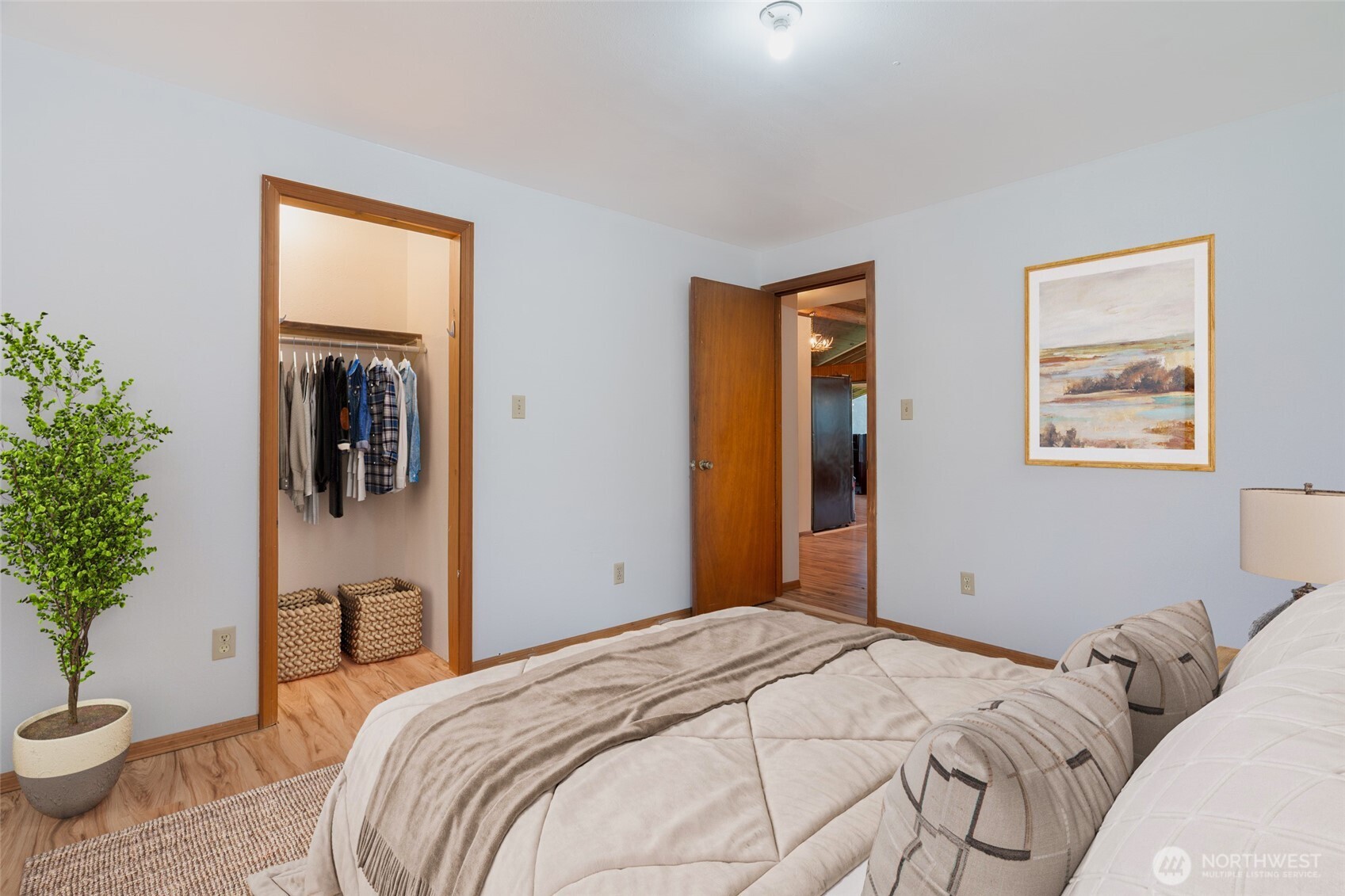10232 333rd Avenue Southeast Sultan, WA 98294 - Photo 15 of 40 a bedroom with a bed and a potted plant