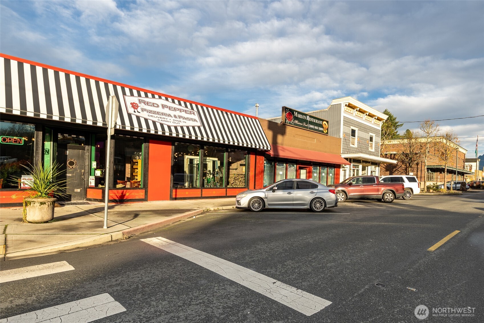 10232 333rd Avenue Southeast Sultan, WA 98294 - Photo 31 of 40 a view of a cars park in front of a building