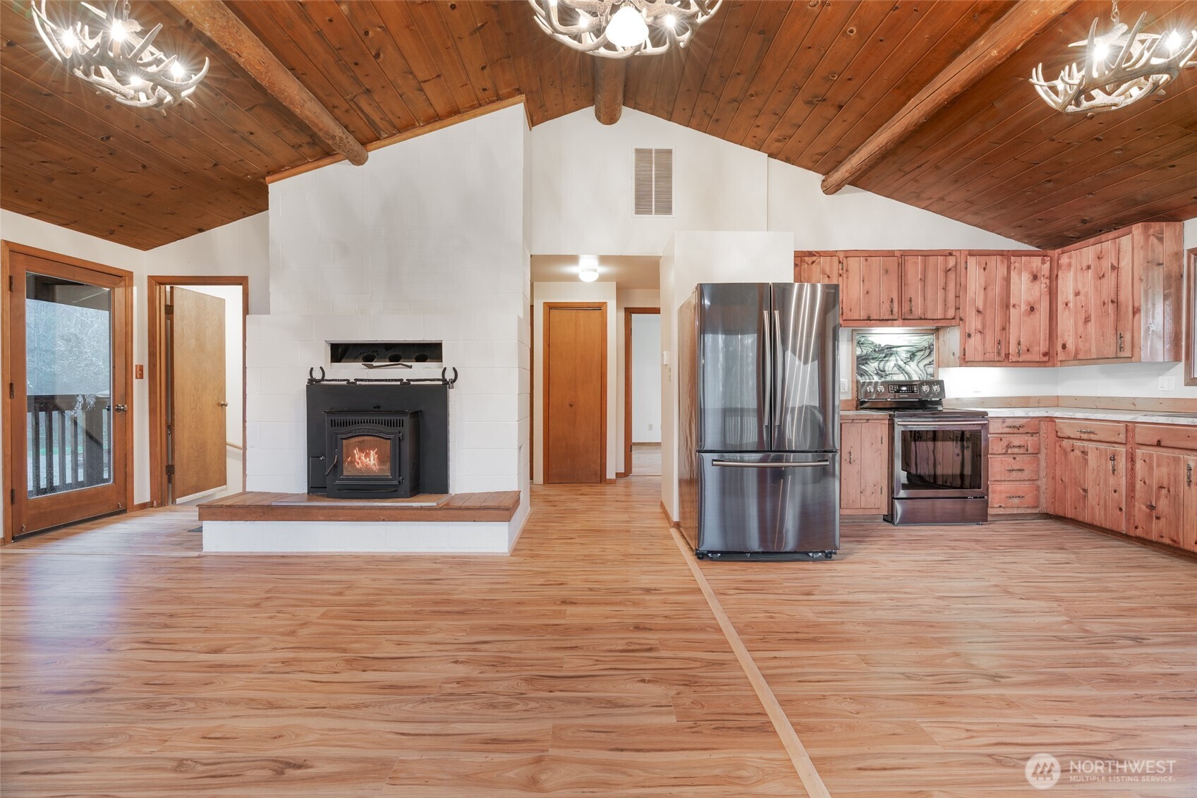 10232 333rd Avenue Southeast Sultan, WA 98294 - Photo 37 of 40 a view of kitchen with furniture and refrigerator