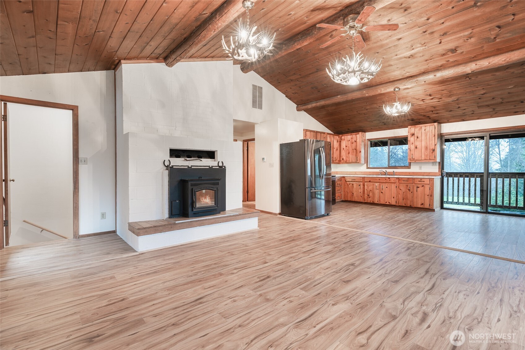 10232 333rd Avenue Southeast Sultan, WA 98294 - Photo 38 of 40 a view of an empty room with a fireplace