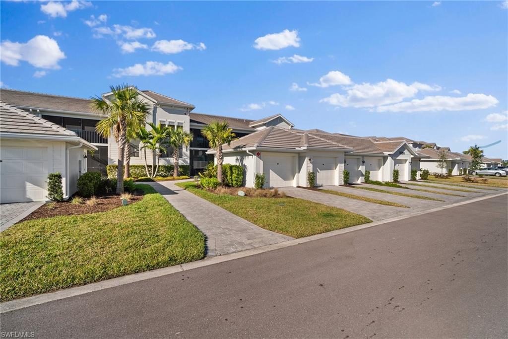 15980 Grassland Lane, Unit 2914 Babcock Ranch, FL 33982 - Photo 5 of 29 a view of building with outdoor space