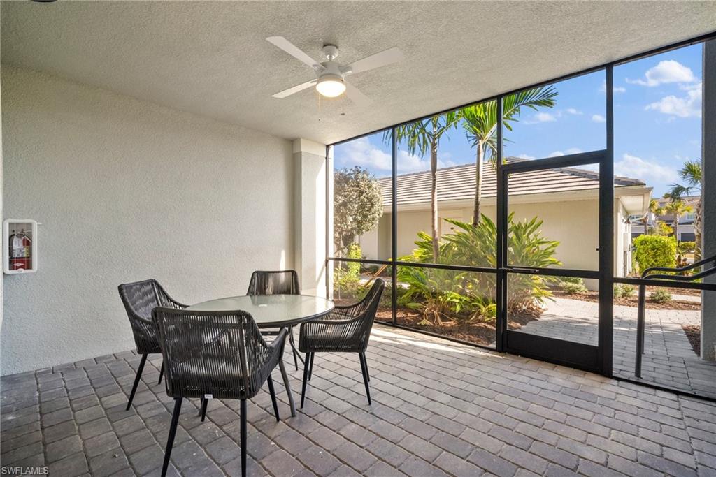 15980 Grassland Lane, Unit 2914 Babcock Ranch, FL 33982 - Photo 8 of 29 an outdoor view from a dining room with furniture window and wooden floor