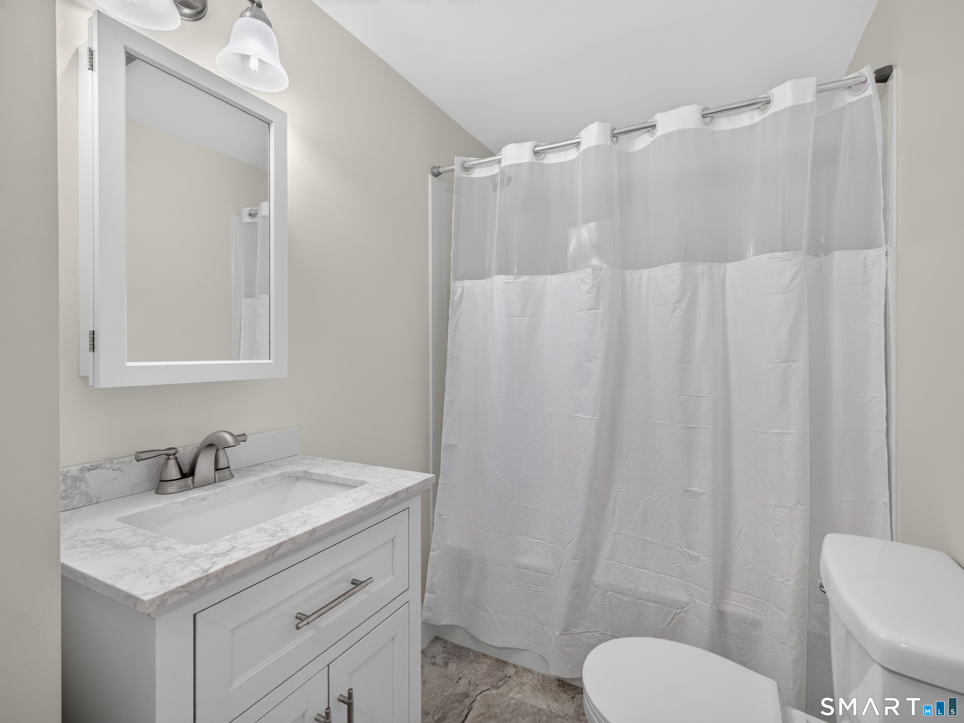 1039 N Road Groton, CT 06340 - Photo 15 of 26 a bathroom with a sink toilet and shower