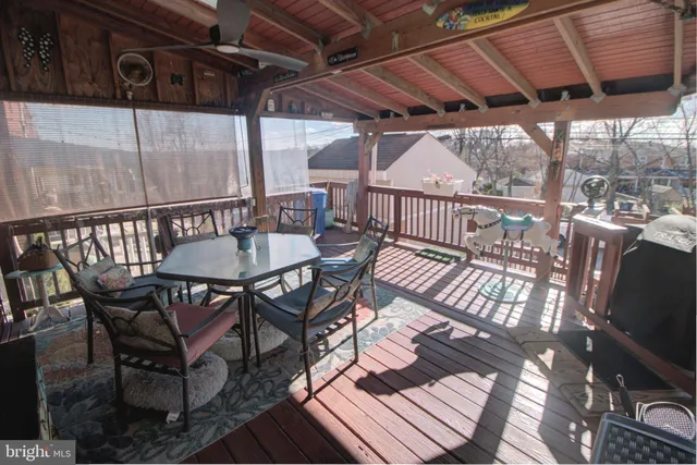 a view of a balcony with furniture