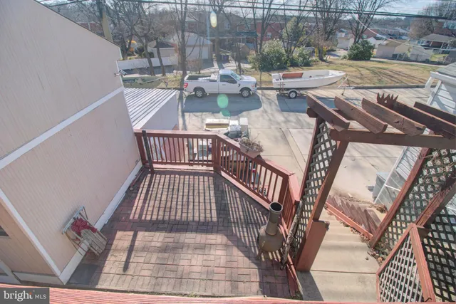 a view of a balcony with furniture