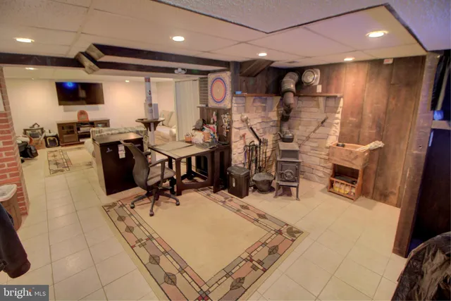 a very nice looking dining room with a large window