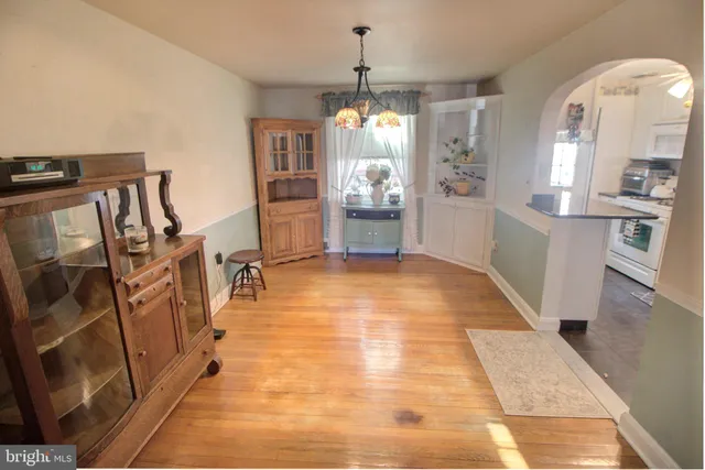 a view of a kitchen from the dinning room