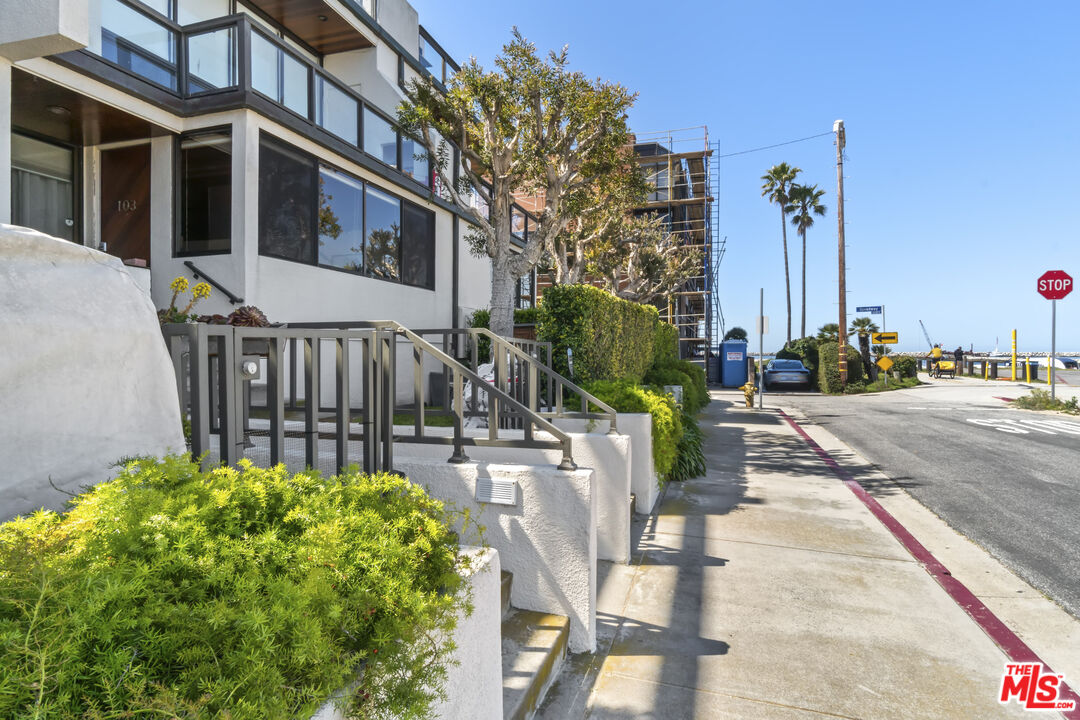 6209 Pacific Avenue, Unit 103 Playa del Rey, CA 90293 - Photo 30 of 40 a view of a patio with couches table and chairs and potted plants