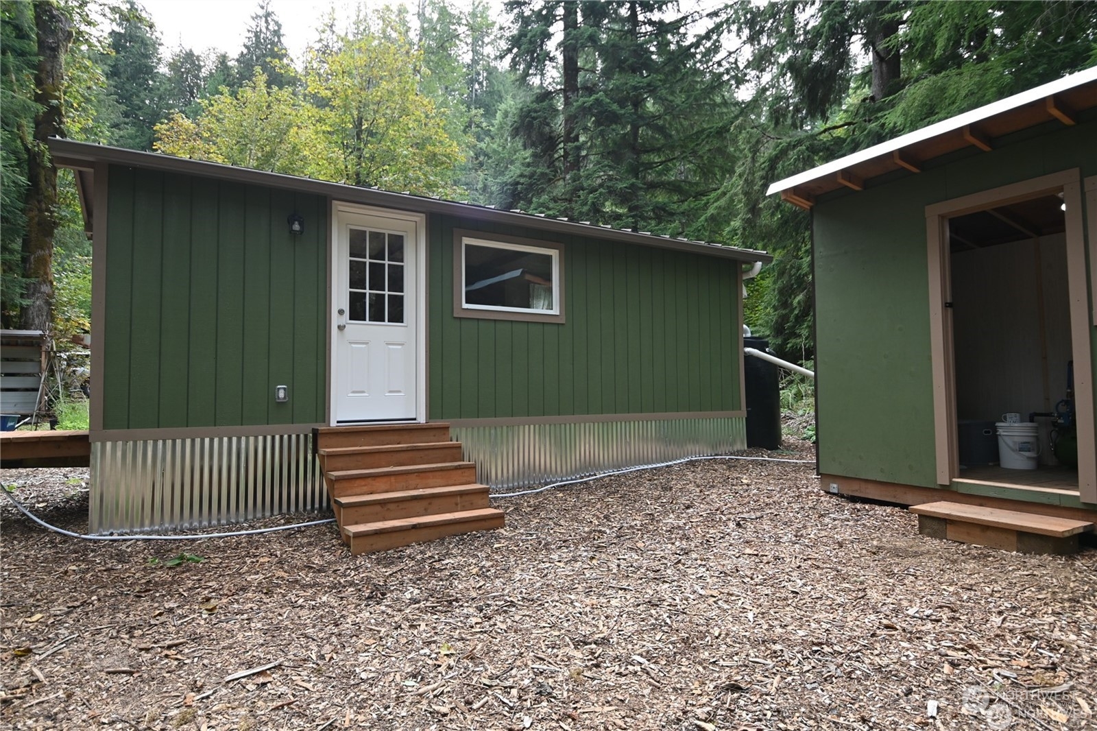53011 Sky Loop Road Gold Bar, WA 98251 - Photo 3 of 24 a front view of a house with a yard