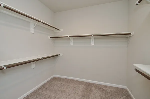 a view of small space with racks on the wall