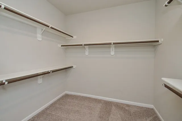 a view of small space with racks on the wall