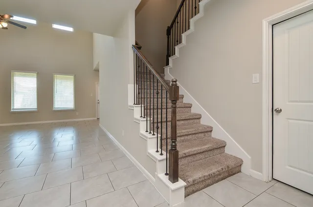 a view of entryway and hall with a window
