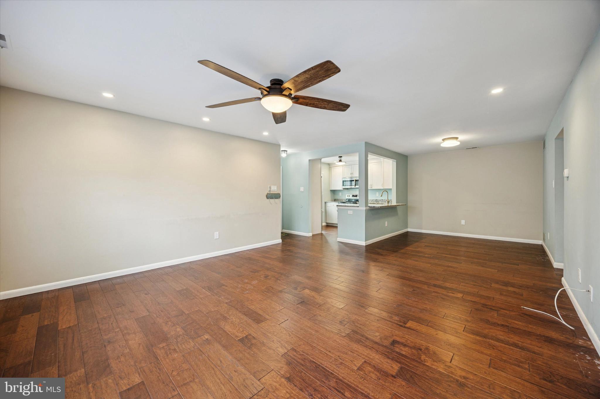 535 Shetland Court Sewell, NJ 08080 - Photo 8 of 25 Living area with hardwood floors