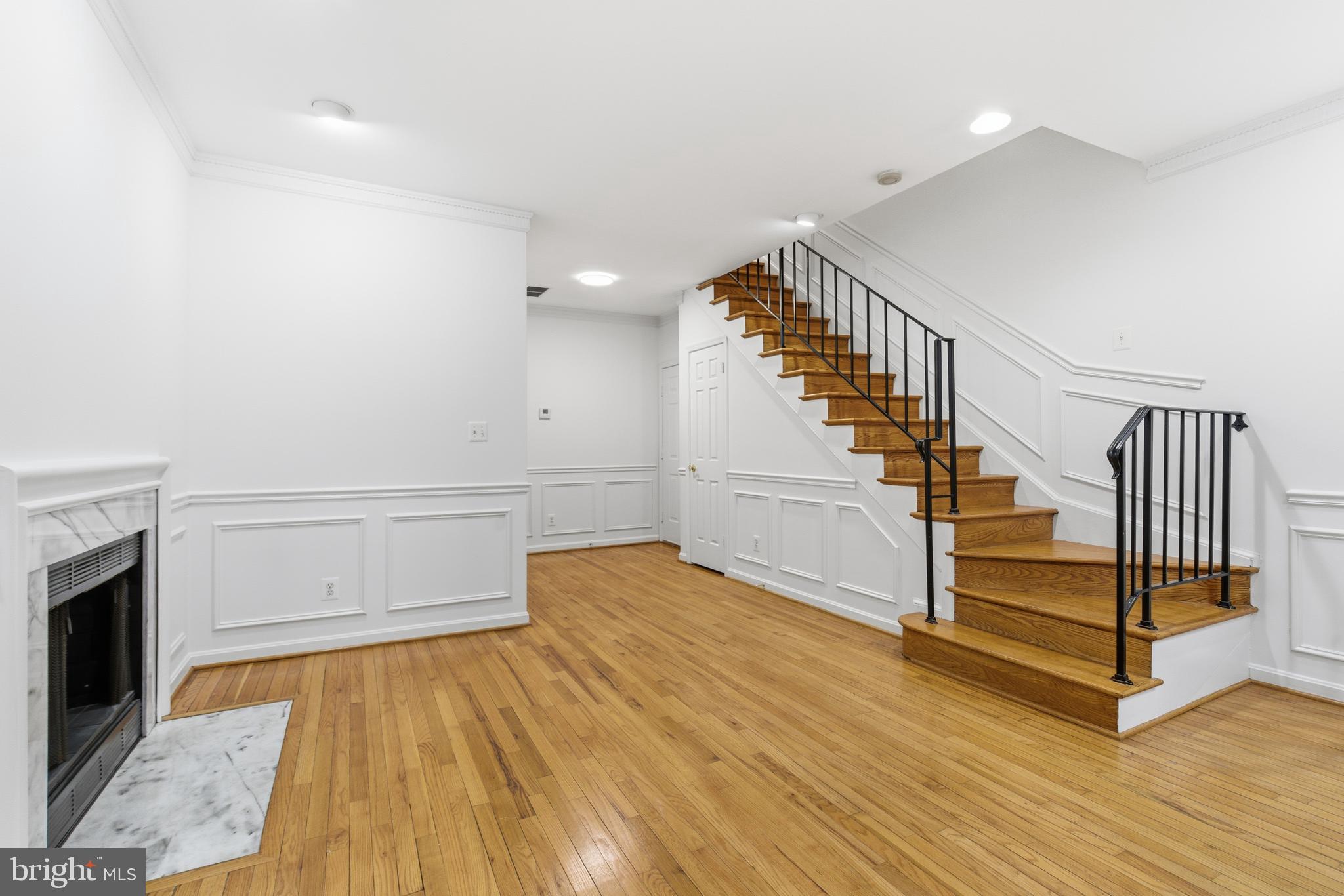 1203 N Street Northwest, Unit E Washington, DC 20005 - Photo 4 of 24 a view of entryway and hall with wooden floor