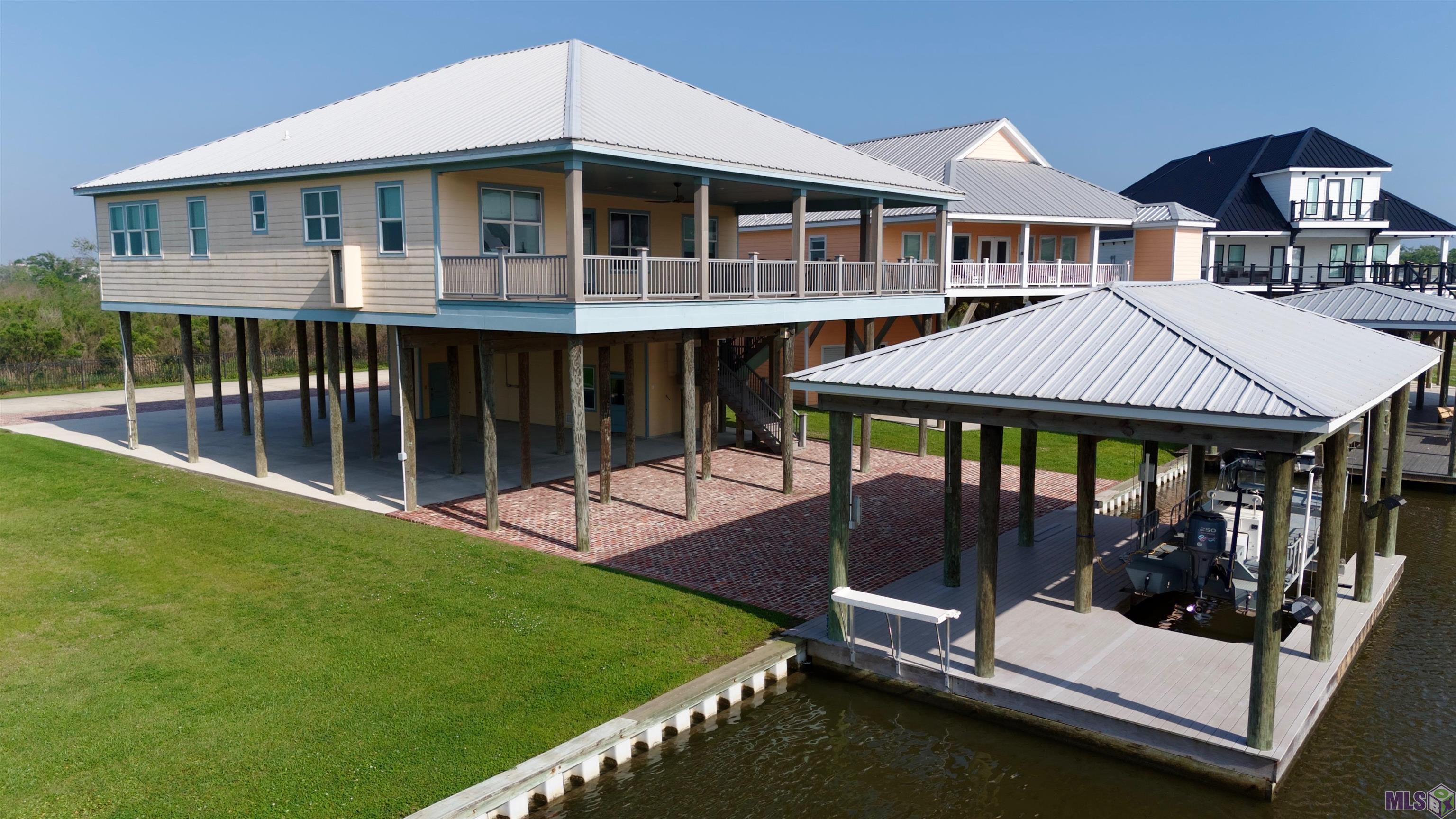 14 Sandy Point Drive Grand Isle, LA 70358 - Photo 2 of 60