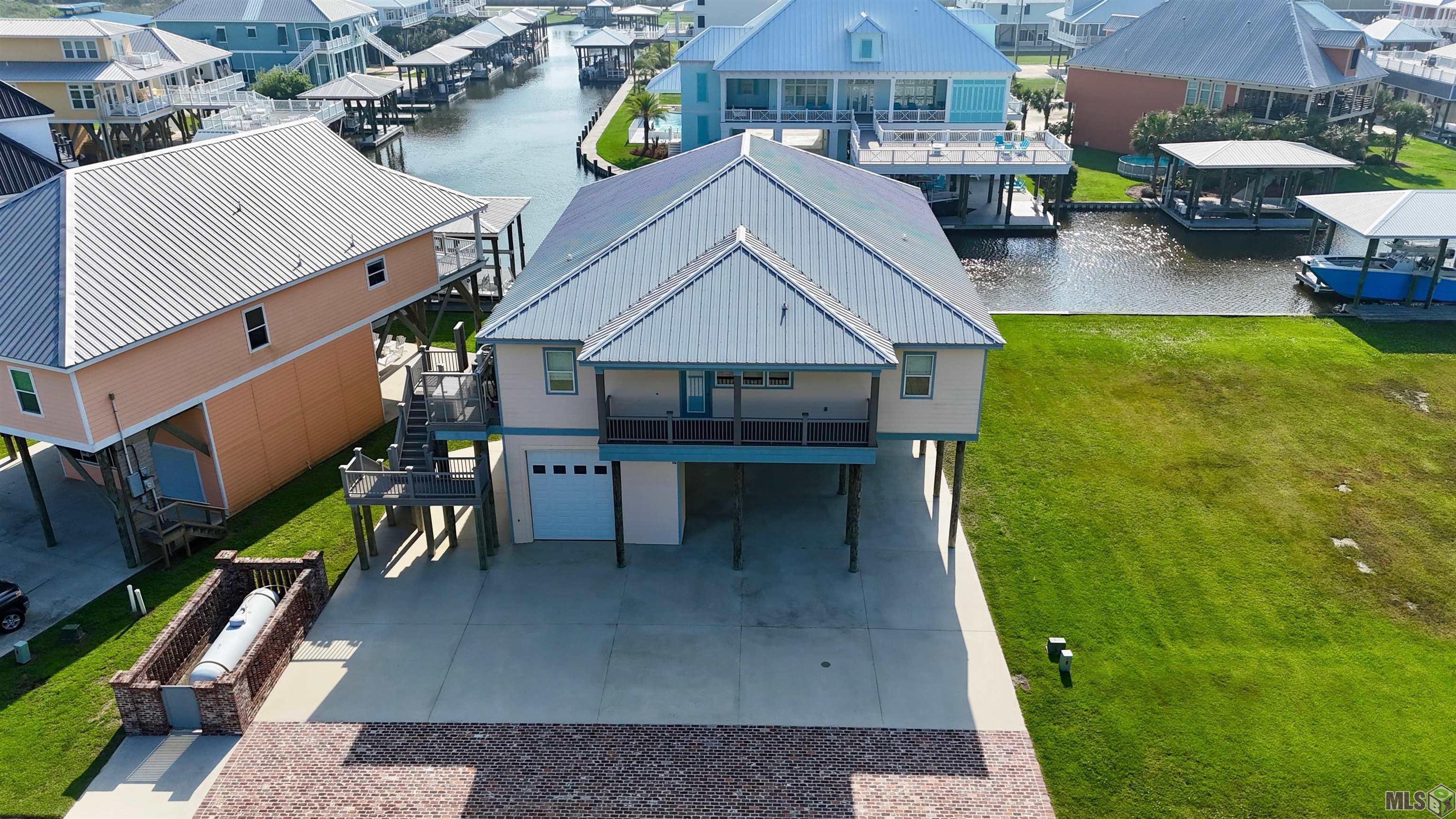 14 Sandy Point Drive Grand Isle, LA 70358 - Photo 3 of 60