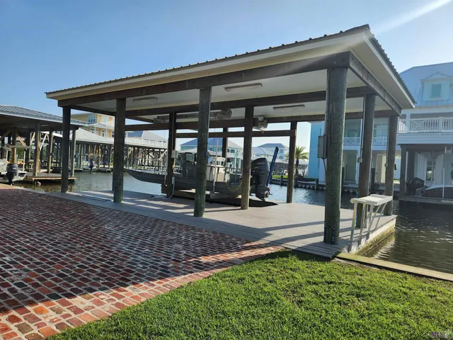 $995,000 | 14 Sandy Point Drive, Grand Isle, LA 70358