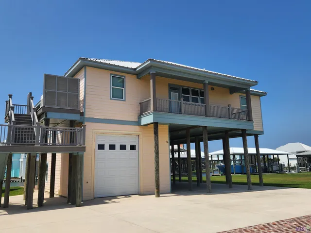 $995,000 | 14 Sandy Point Drive, Grand Isle, LA 70358