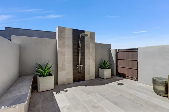 a view of a garden and basketball court
