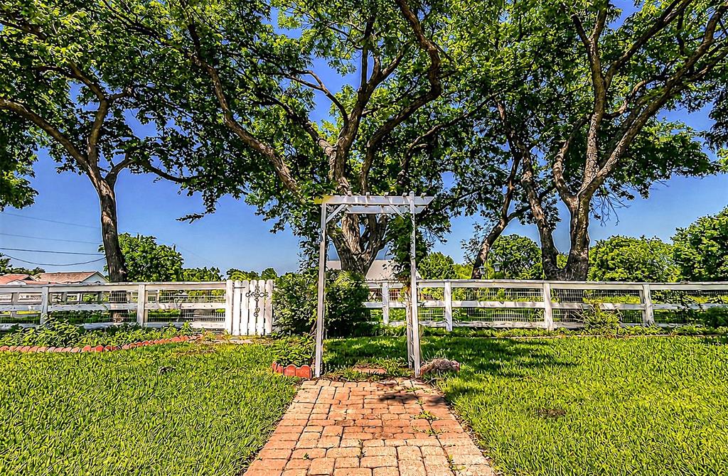 9310 Merritt Road Rowlett, TX 75089 - Photo 25 of 40 a view of a house with a yard