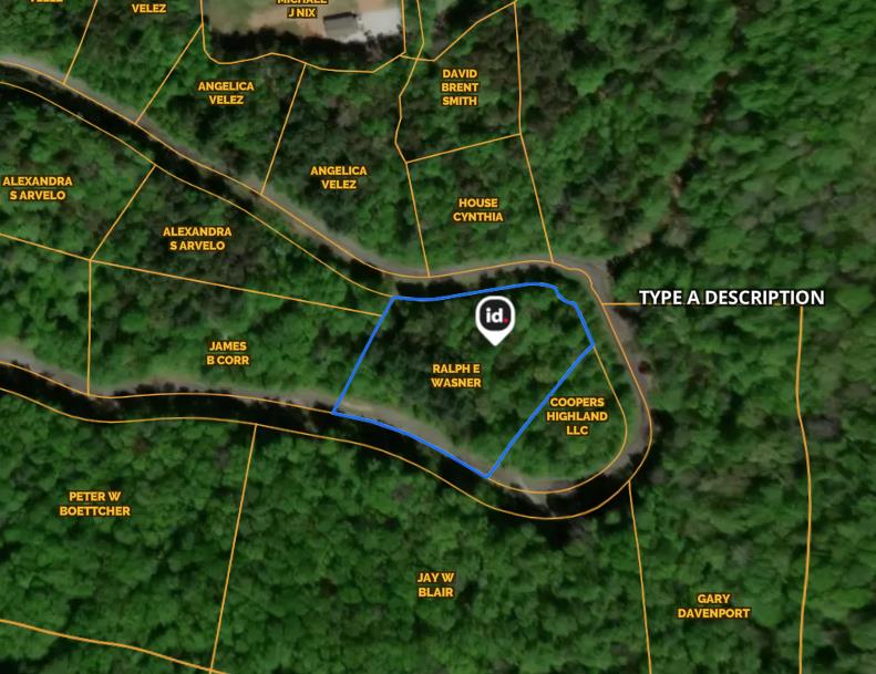 an aerial view of a wooden fence and a bench