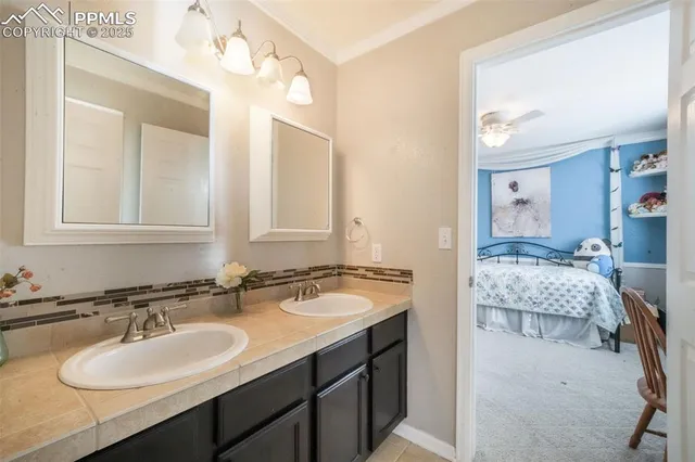 a bathroom with a toilet and a sink